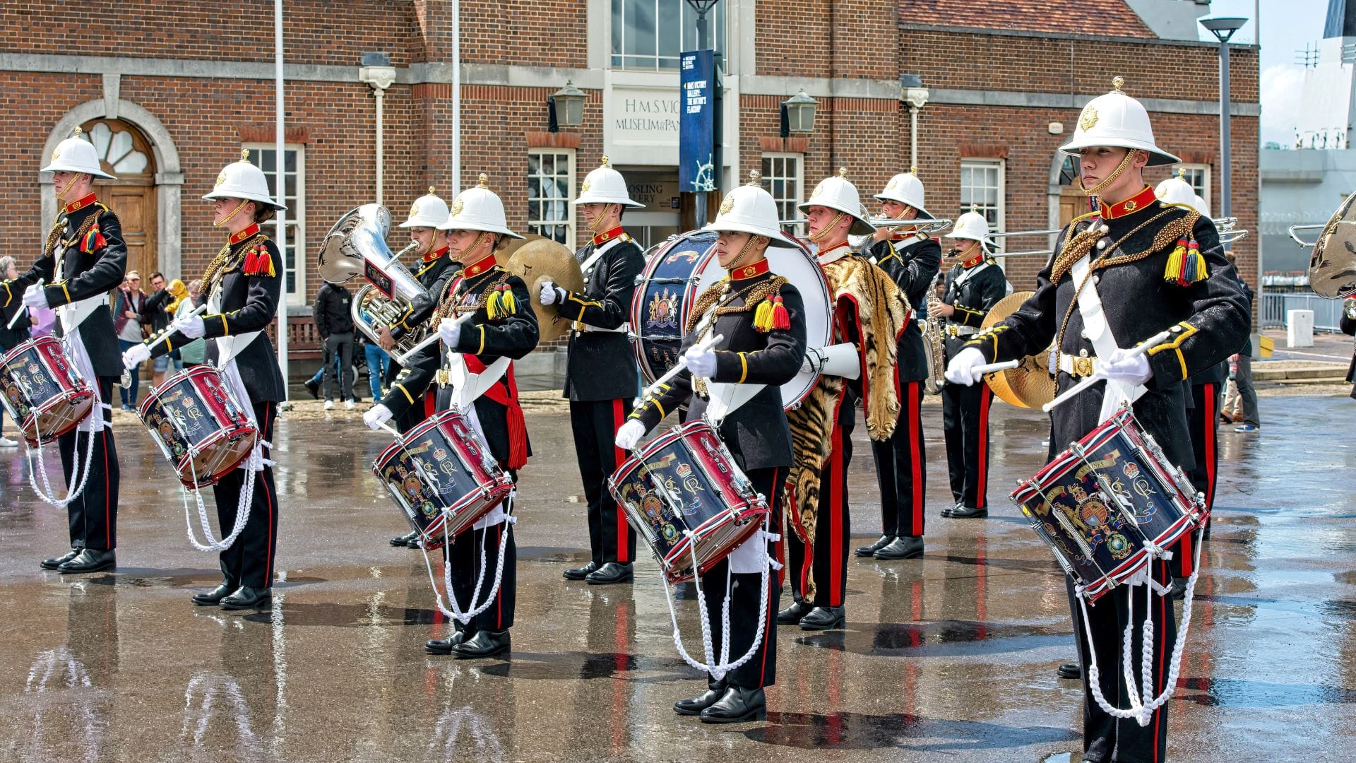 Royal Marines Band play outside HMS Victory Gallery at Portsmouth Historic Dockyard